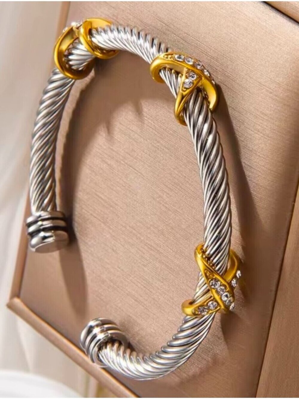 Two-Tone Silver and Gold Twisted Cable Cuff with Crystal Knots